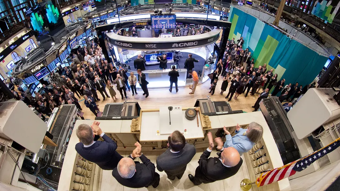 An official ringing the opening bell at the New York Stock Exchange