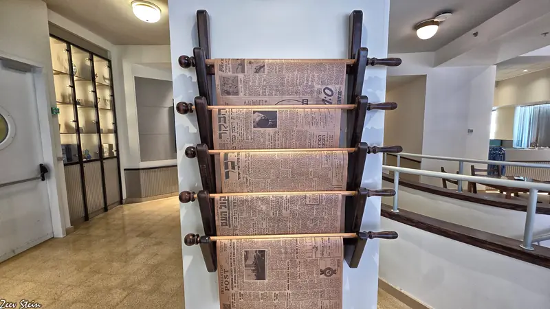 A stack of printed daily newspapers