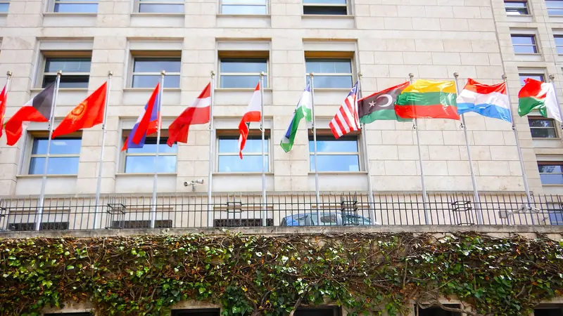 An international headquarters building with flags