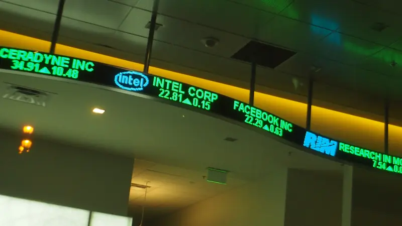 An electronic board showing stock prices